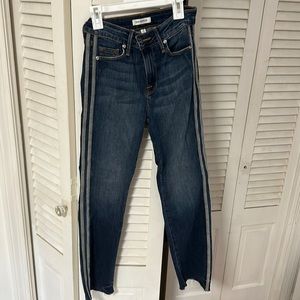 Good American blue, flare, jeans. Detailing down the sides.